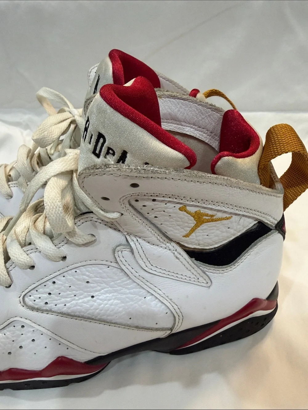 Jordan Men's White Basketball Shoes with Black, Red & Gold Accents
